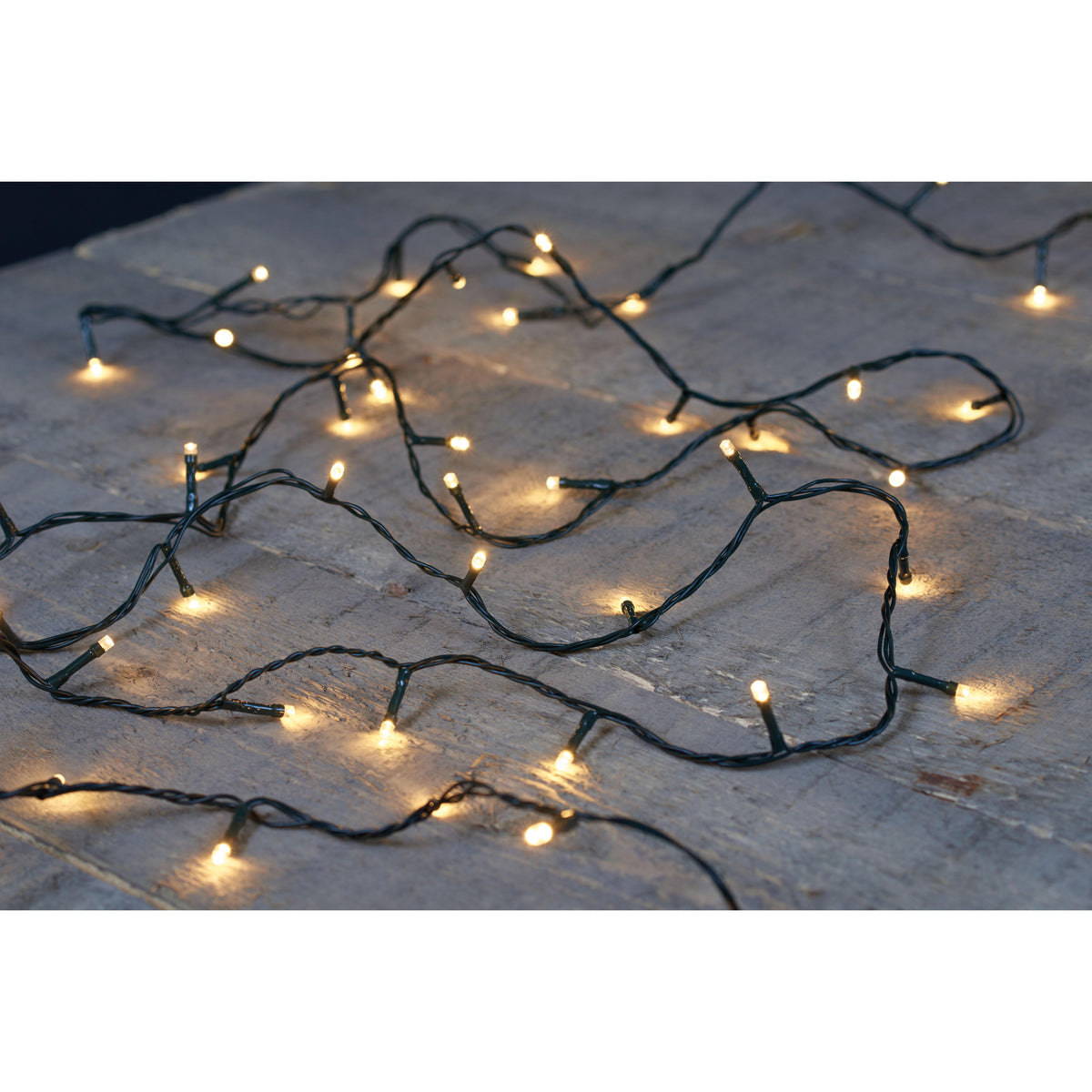 kerstverlichting-warm-wit-150-cm-20-led-lampjes-zwart-snoer-op-batterijen_10435821