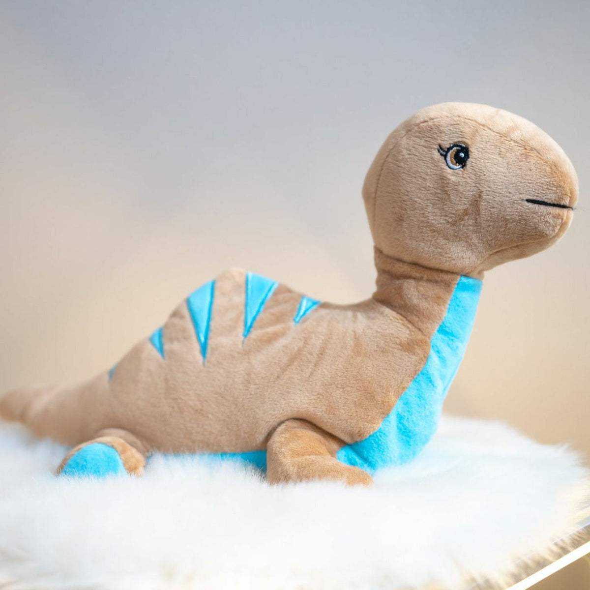 Heat/Microwave warming cuddle toy - Dinosaur - brown - 35 cm - with flaxseed filling